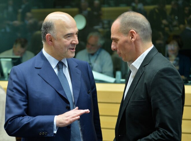 Pierre Moscovici et Yánis Varoufákis avant l'ouverture de l'Eurogroupe du 25 juin 2015 à Bruxelles. © AFP Pierre Moscovici et Yánis Varoufákis avant l'ouverture de l'Eurogroupe du 25 juin 2015 à Bruxelles. © AFP