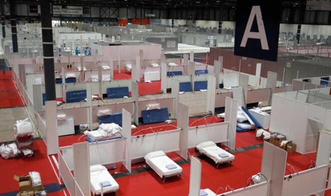 Le centre des congrès de Madrid dans lequel s'est tenue la COP25, transformé en "hôpital" de fortune pour faire face à la pandémie Le centre des congrès de Madrid dans lequel s'est tenue la COP25, transformé en "hôpital" de fortune pour faire face à la pandémie