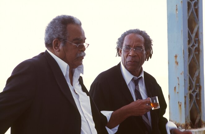 Édouard Glissant et Jacques Coursil en 2005 à Carthage, lors du colloque international « Autour d'Édouard Glissant ». Édouard Glissant et Jacques Coursil en 2005 à Carthage, lors du colloque international « Autour d'Édouard Glissant ».