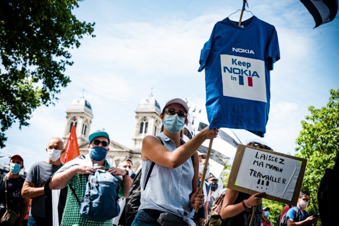 La manifestation parisienne des salariés de Nokia, le 8 juillet. © Samuel Boivin / NurPhoto via AFP La manifestation parisienne des salariés de Nokia, le 8 juillet. © Samuel Boivin / NurPhoto via AFP