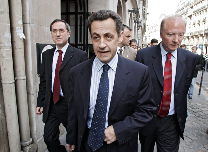 Claude Guéant, Nicolas Sarkozy et Brice Hortefeux, en juin 2005. © PASCAL PAVANI / AFP