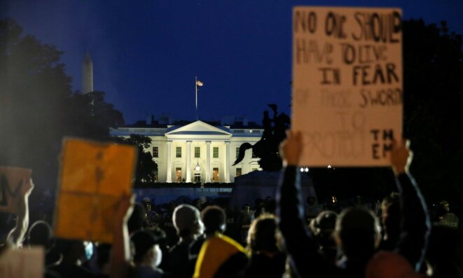 Crowds protest outside the White House. © Photograph: Jim Bourg/Reuters Crowds protest outside the White House. © Photograph: Jim Bourg/Reuters