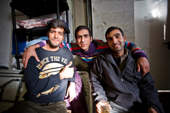 Trois exilés heureux d'avoir réussis à passer la frontière © Durand Thibaut