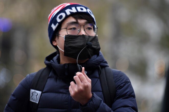 Le lanceur d'alerte Simon Cheng dans un meeting à Londres, le 12 décembre 2020. © Justin Tallis/AFP