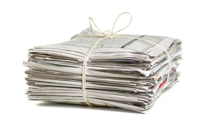 depositphotos-19516717-stock-photo-pile-of-newspapers