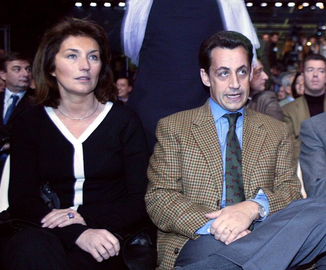 Cécilia Attias (alors Sarkozy), en novembre 2002, avec son mari au congrès fondateur de l’UMP. © FRANCOIS GUILLOT/AFP Cécilia Attias (alors Sarkozy), en novembre 2002, avec son mari au congrès fondateur de l’UMP. © FRANCOIS GUILLOT/AFP