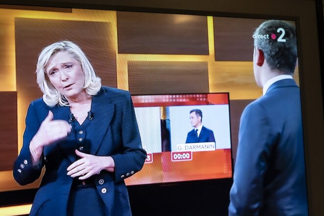 Gérald Darmanin et Marine Le Pen sur France 2, le 11 février 2021. © Laure Boyer / Hans Lucas via AFP Gérald Darmanin et Marine Le Pen sur France 2, le 11 février 2021. © Laure Boyer / Hans Lucas via AFP