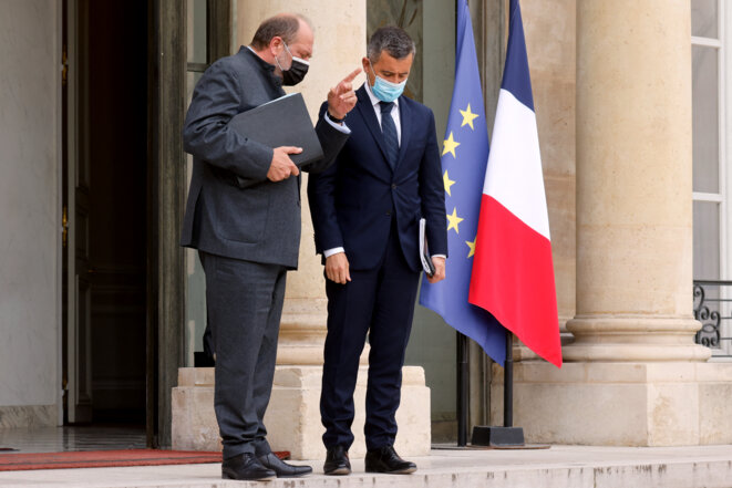 Éric Dupond-Moretti et Gérald Darmanin à la sortie du Conseil des ministres, le 28 avril. © Ludovic Marin / AFP