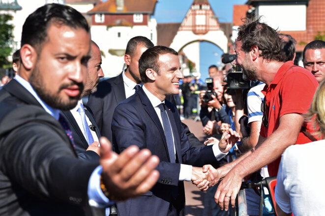 Alexandre Benalla and Emmanuel Macron at Le Touquet in northern France, June 2017. © CHRISTOPHE ARCHAMBAULT / AFP