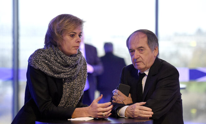 Noël Le Graët, et la directrice marketing de la FFF, Florence Hardouin, le 12 décembre 2015 à Paris. © Photo Franck Fife / AFP