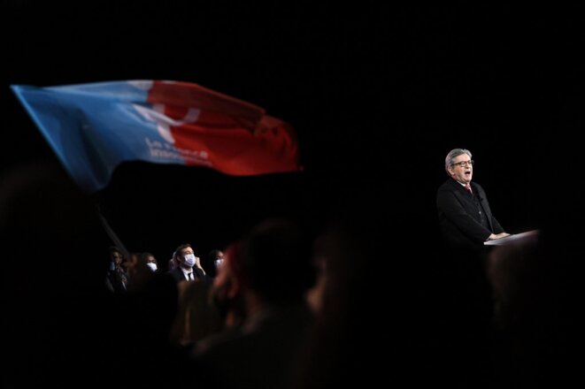 Jean-Luc Mélenchon speaking at his rally in the La Défense district of Paris, December 5th 2021. © Photo Anne-Christine Poujoulat / AFP