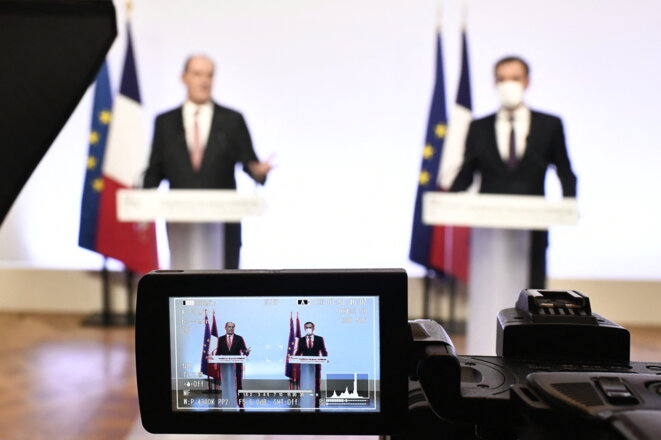 Le premier ministre Jean Castex et le ministre de la santé Olivier Véran, le 27 décembre 2021, à Matignon. © STEPHANE DE SAKUTIN / AFP