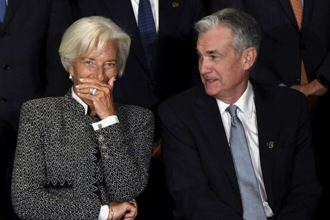 Christine Lagarde avec le président de la Réserve fédérale américaines, Jerome Powell, en 2018. © Photo Eitan Abramovich/AFP