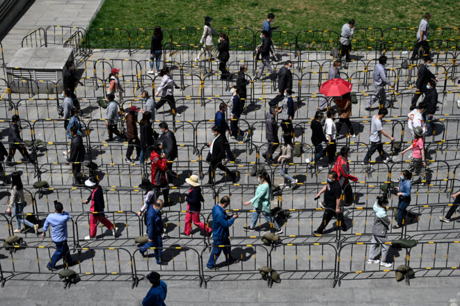Des files d’attente pour des tests à Pékin, le 26 avril 2022. © Photo Jade Gao/AFP