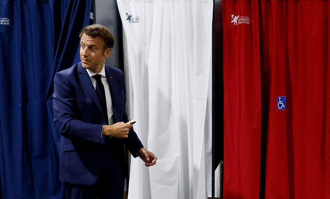 Emmanuel Macron voting in the first round at Le Touquet in northern France, June 12th 2022. © Photo Ludovic Marin / AFP