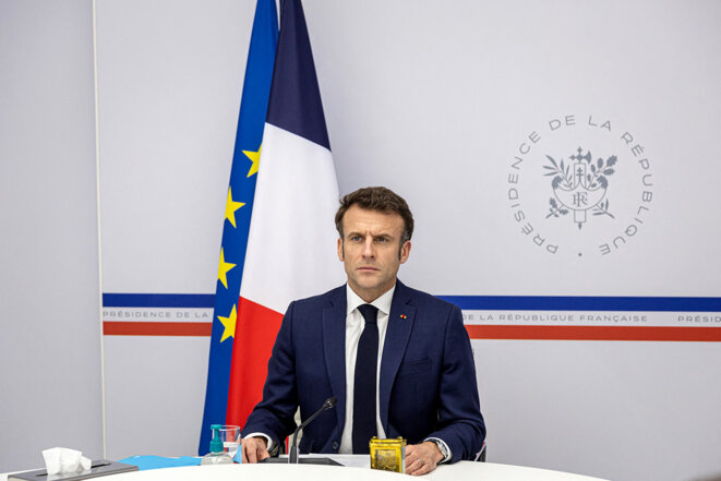 Emmanuel Macron pictured during a conference by video link with G7 leaders and Ukrainian president Volodymyr Zelensky, February 24th 2023 © Photo Christophe Petit-Tesson / Pool / AFP