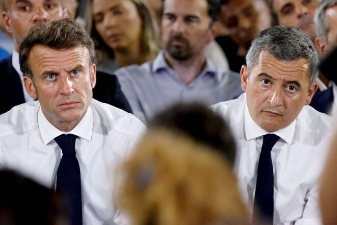 Emmanuel Macron and interior minister Gérald Darmanin during a public meeting in the La Busserine district of Marseille, June 26th 2023. © Photo Ludovic Marin / Pool / AFP
