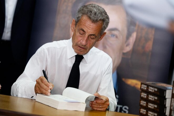 Nicolas Sarkozy signing copies of his latest books at La Baule on the west coast of France, August 22nd 2023. © Photo Estelle Ruiz / Hans Lucas via AFP