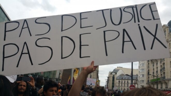 Que signifie le slogan « Pas de justice, pas de paix » ?
