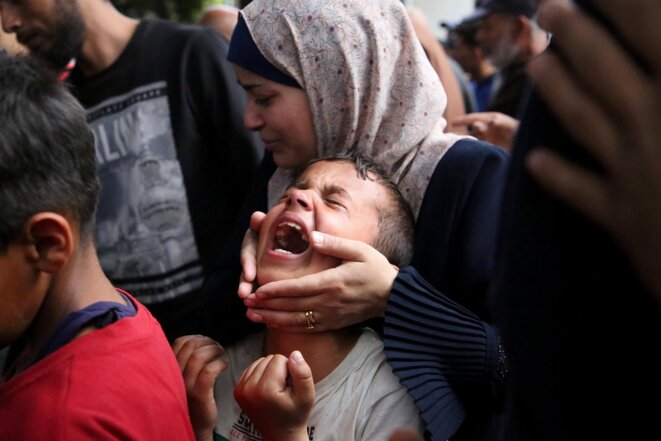 A young boy cries over the death of a relative at Rafah in the south of the Gaza Strip, April 1st 2024. © Photo Khaled Omar / Xinhua / Sipa