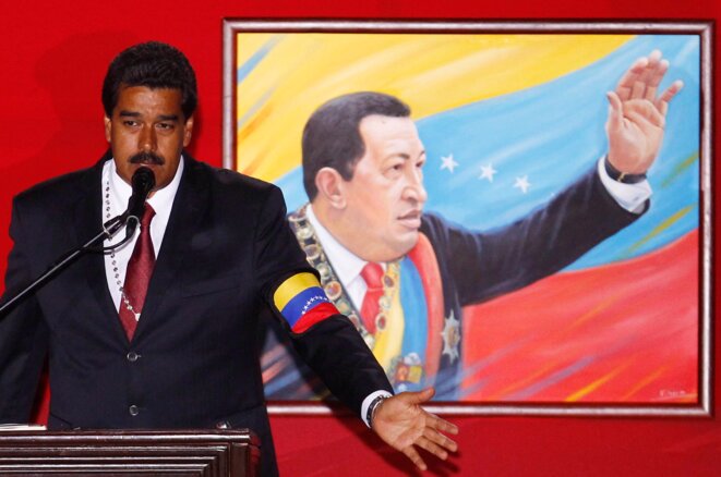 Nicolás Maduro conmemorando el regreso al poder de Chávez en el 2002 el día anterior a las elecciones. © Carlos Garcia Rawlins/Reuters