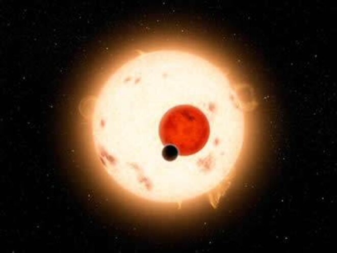 Vue artistique d'une éclipse provoquée par la planète Kepler-16b Vue artistique d'une éclipse provoquée par la planète Kepler-16b