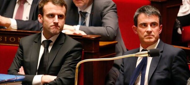 Le ministre de l'Economie Emmanuel Macron et le premier ministre Manuel Valls à l'Assemblée nationale ce mardi. © Reuters