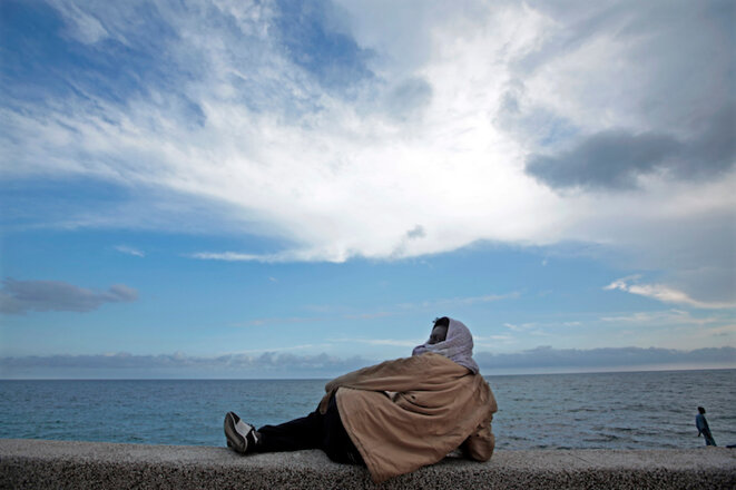 Un migrant originaire d'Erythrée à la frontière entre Vintimille et Menton le 14 juin 2015. © Eric Gaillard/Reuters Un migrant originaire d'Erythrée à la frontière entre Vintimille et Menton le 14 juin 2015. © Eric Gaillard/Reuters