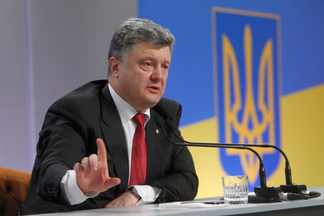 Petro Porochenko, le président ukrainien, lors d'une conférence de presse, septembre 2014 © Reuters Petro Porochenko, le président ukrainien, lors d'une conférence de presse, septembre 2014 © Reuters