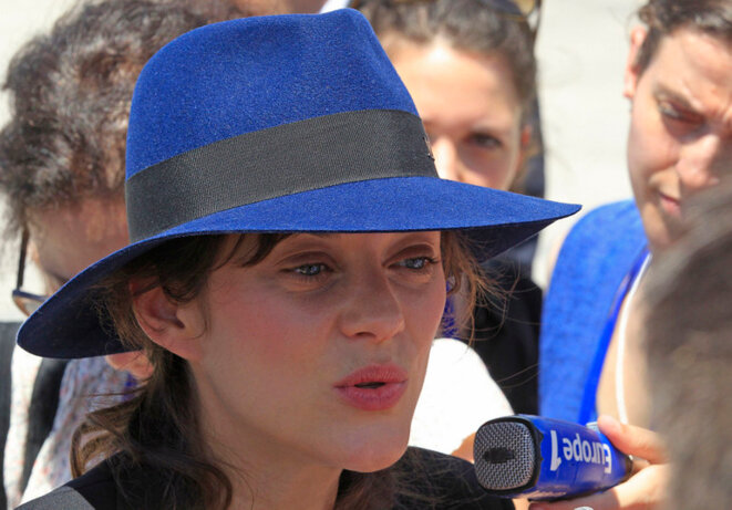 Marion Cotillard répond aux journalistes à Manille, jeudi 26 février 2015. © Reuters. Marion Cotillard répond aux journalistes à Manille, jeudi 26 février 2015. © Reuters.