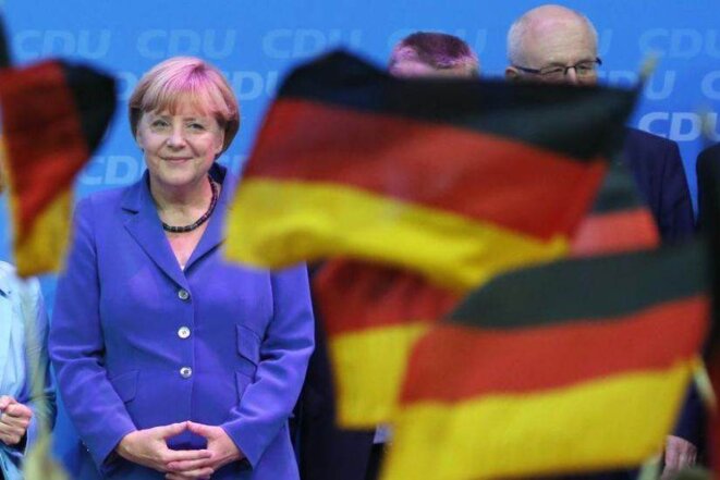 Angela Merkel au siège de la CDU, dimanche soir. © Reuters Angela Merkel au siège de la CDU, dimanche soir. © Reuters